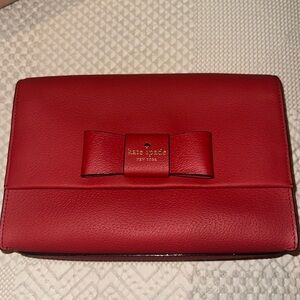 red Kate Spade bag never used